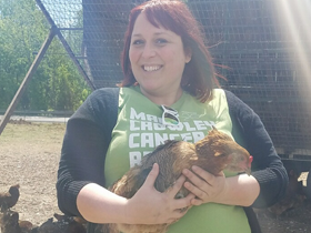 Employee Stacey with chicken