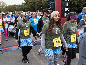 Team members crossing the finishline