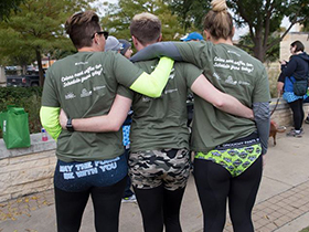 Team members show off their festive underwear during the race.