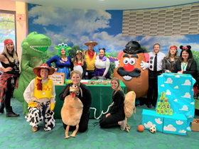 Mary Crowley clinic team dressed as Toy Story characters at children's hospital Halloween carnival